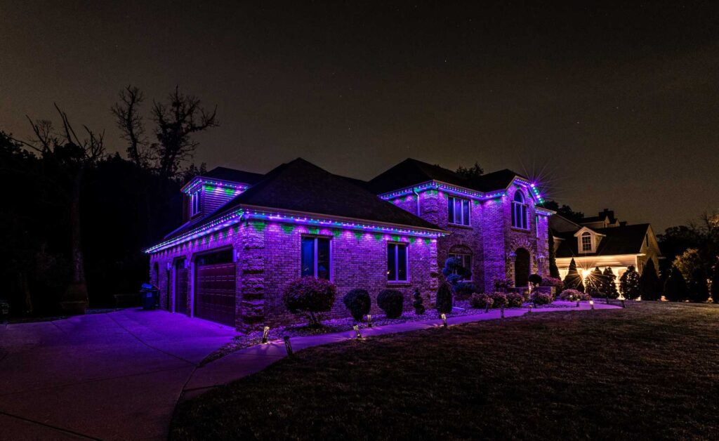 Permanent multicolor roofline lights on a residential property